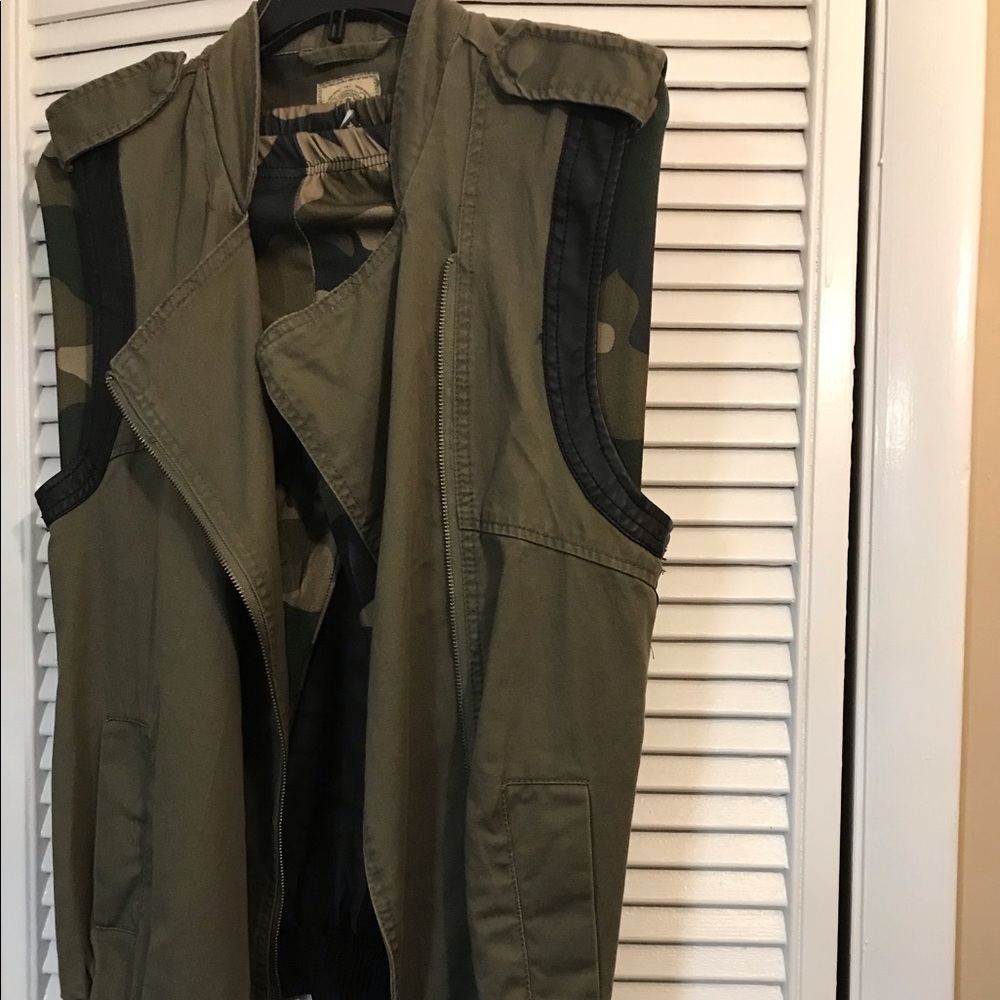 Two camo vest jackets